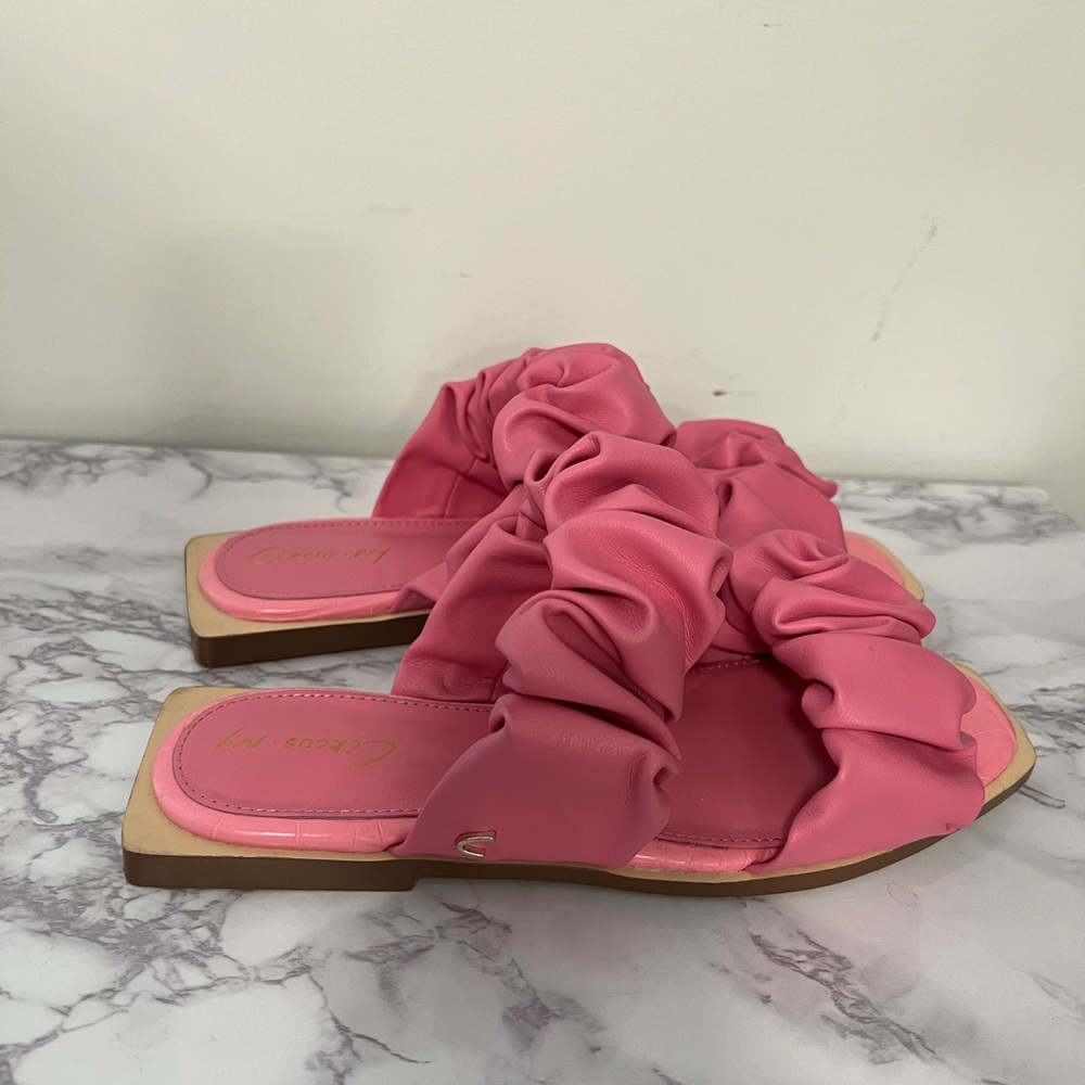Only tried on otherwise brand new Pink sandals.
